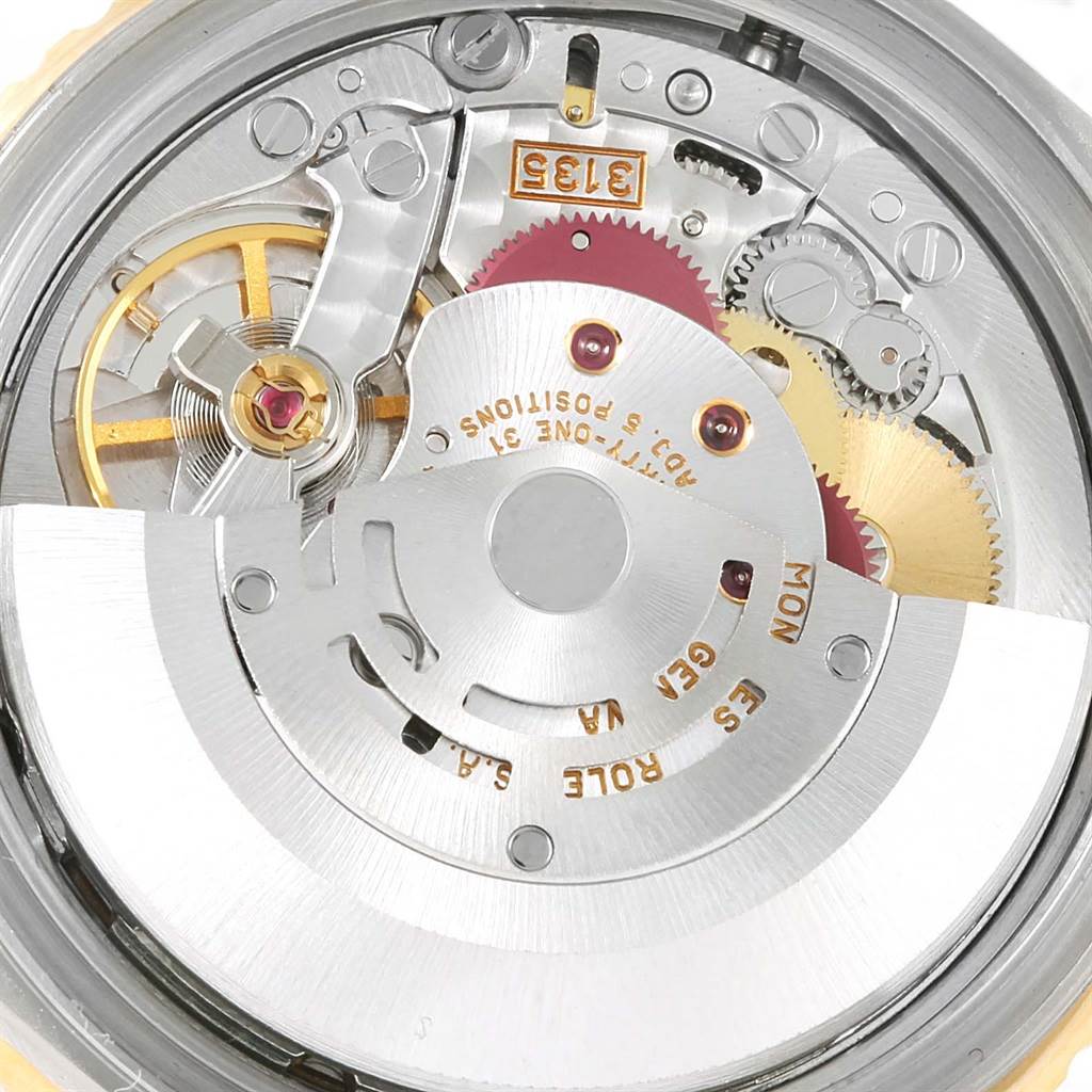 This image shows the inner mechanical movement of the Rolex Turn-o-Graph 16263 Men's Steel and Gold (two tone) Champagne Dial 16263 Men's Steel and Gold (two tone) Champagne Dial watch, highlighting gears and the rotor.