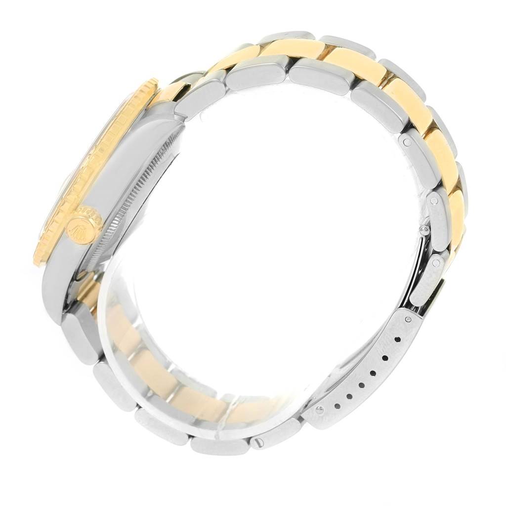 The Rolex Turn-o-Graph 16263 Men's Steel and Gold (two tone) Champagne Dial 16263 Men's Steel and Gold (two tone) Champagne Dial watch is shown from a side angle, highlighting the crown and bracelet.