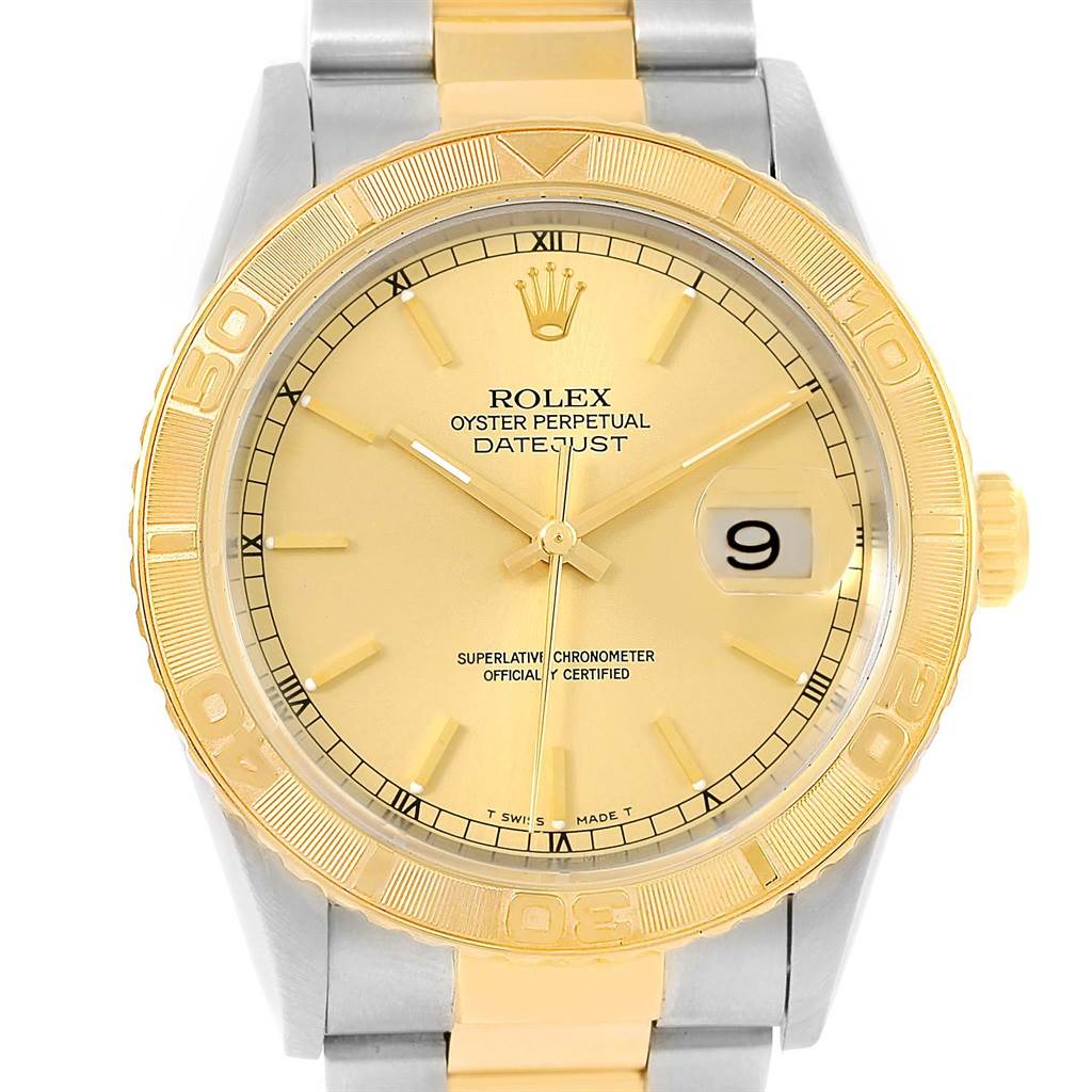 The image shows a front view of the Rolex Turn-o-Graph 16263 Men's Steel and Gold (two tone) Champagne Dial 16263 Men's Steel and Gold (two tone) Champagne Dial Datejust watch, highlighting the dial, bezel, and two-tone bracelet.