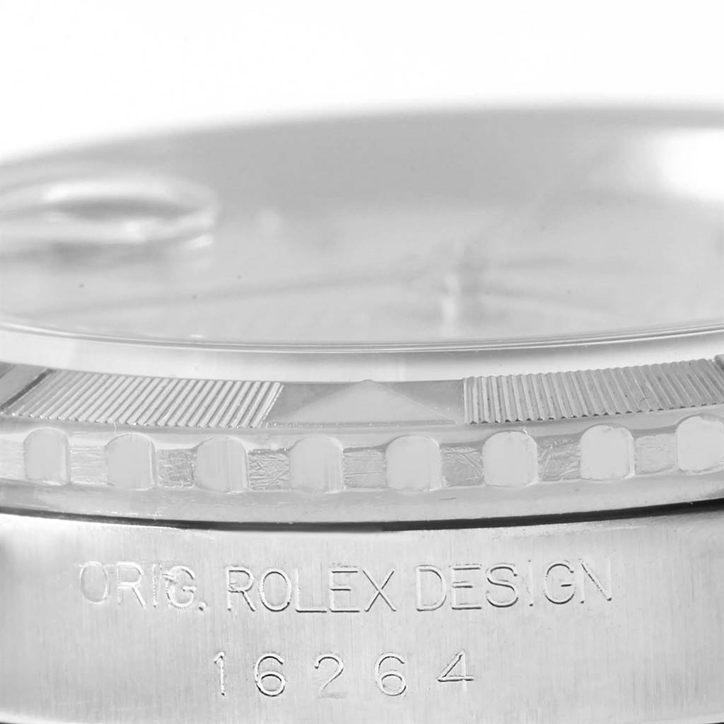 The image shows a close-up of the side of the Rolex Turn-o-Graph 16264 Men's Stainless Steel Silver Dial 16264 Men's Stainless Steel Silver Dial model, highlighting the bezel and case with the engraving.