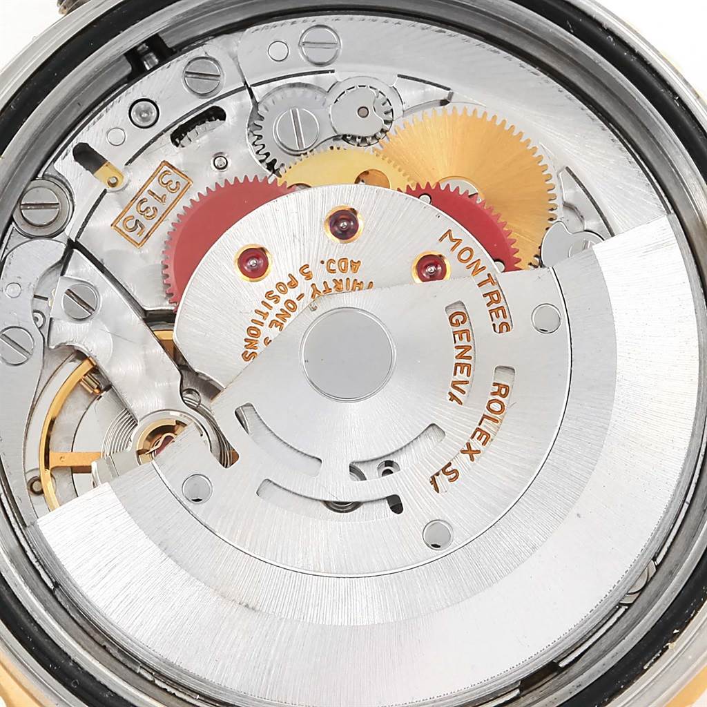 The image shows a close-up of the internal mechanisms and rotor of a Rolex Turn-o-Graph 16263 Men
s Steel and Gold (two tone) White Dial 16263 Men
s Steel and Gold (two tone) White Dial watch.