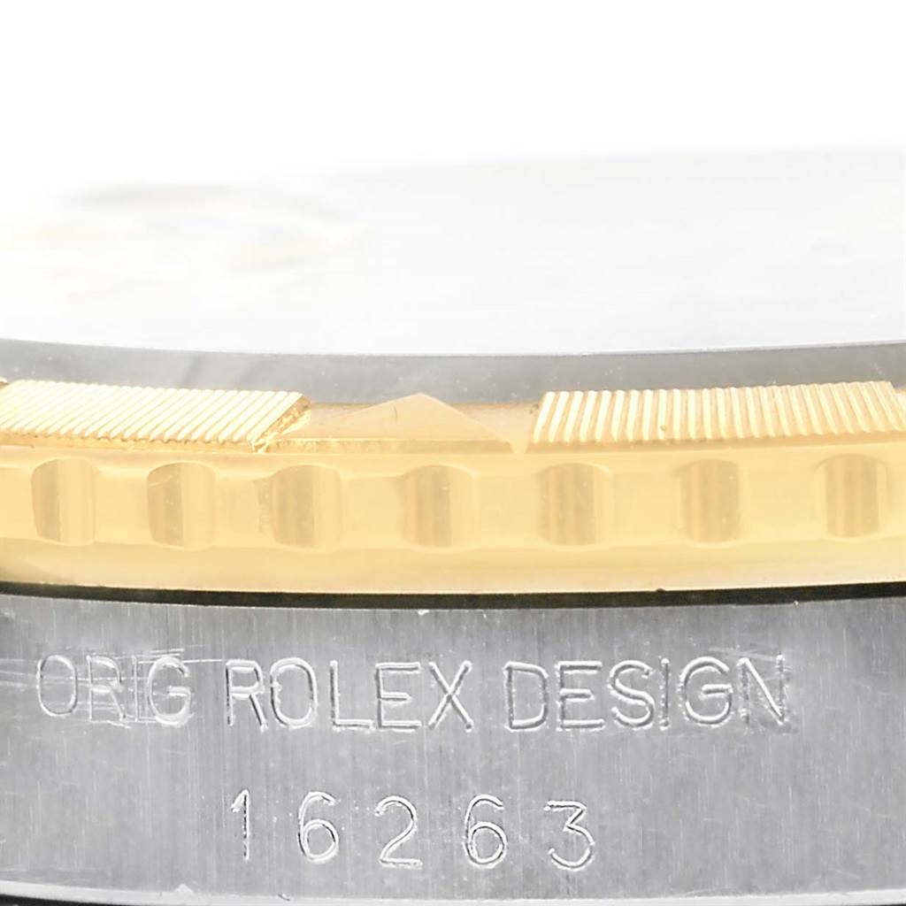 This image shows the side view of a Rolex Turn-o-Graph 16263 Men
s Steel and Gold (two tone) White Dial 16263 Men
s Steel and Gold (two tone) White Dial model
s bezel and case, displaying the engraving "ORIG ROLEX DESIGN 16263."