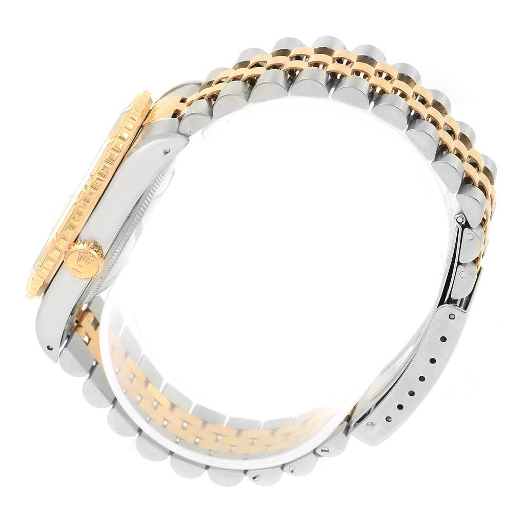 This image shows a Rolex Turn-o-Graph 16263 Men
s Steel and Gold (two tone) White Dial 16263 Men
s Steel and Gold (two tone) White Dial watch in a side angle with visible crown, bezel, and bracelet.