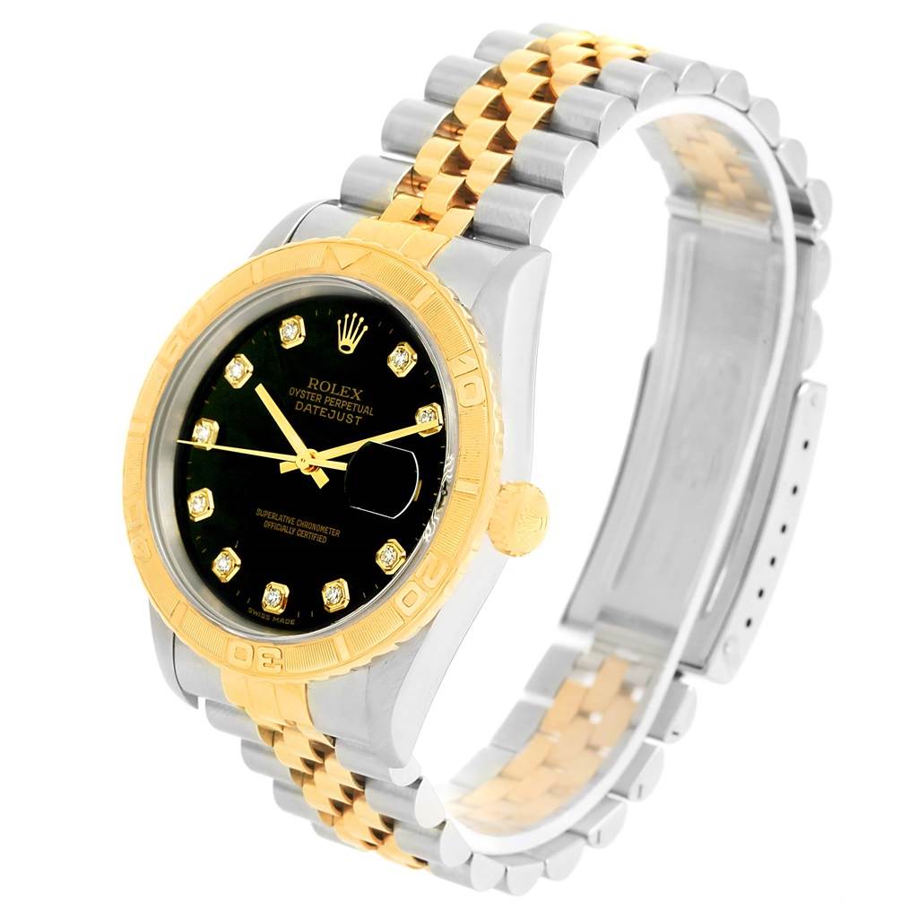 The Rolex Turn-o-Graph 16263 Men
s Steel and Gold (two tone) Black Dial 16263 Men
s Steel and Gold (two tone) Black Dial model is shown at a slight angle, displaying its face, bezel, and two-tone bracelet.