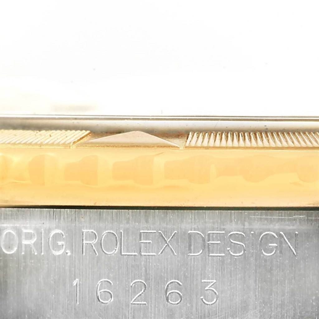 This image shows a close-up of the side of a Rolex Turn-o-Graph 16263 Men
s Steel and Gold (two tone) Black Dial 16263 Men
s Steel and Gold (two tone) Black Dial watch, highlighting the bezel and the engraved model number 16263.