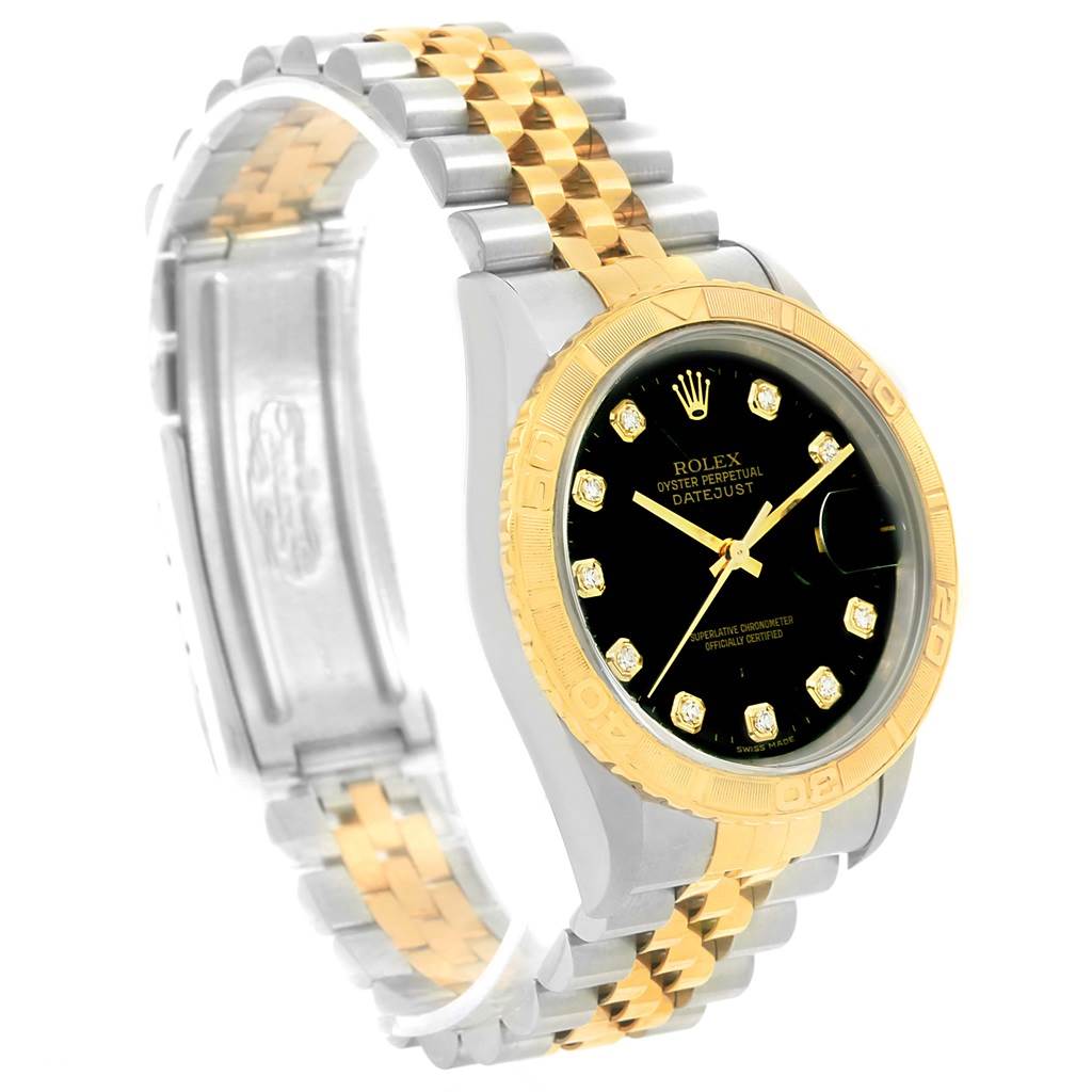 The image shows a Rolex Turn-o-Graph 16263 Men
s Steel and Gold (two tone) Black Dial 16263 Men
s Steel and Gold (two tone) Black Dial watch at a side angle, highlighting the two-tone band, black dial, and gold bezel.