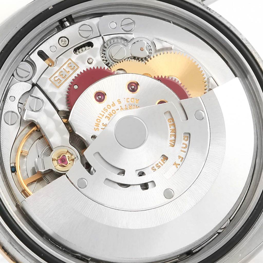 The image shows the inner mechanical movement of a Rolex Turn-o-Graph 116263 Men
s Stainless Steel White Dial 116263 Men
s Stainless Steel White Dial watch at close-up.