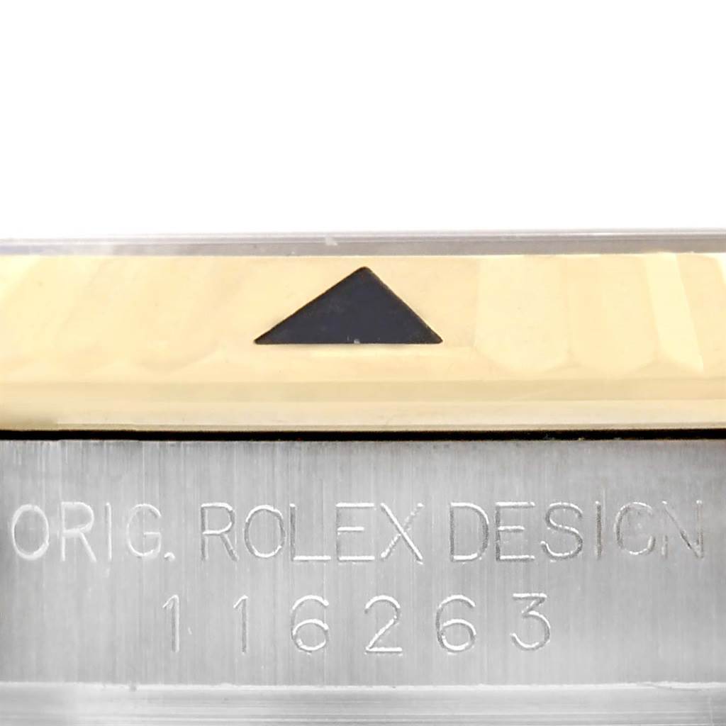 This image shows a close-up of the dial and engraved side of the Rolex Turn-o-Graph 116263 Men
s Stainless Steel White Dial 116263 Men
s Stainless Steel White Dial model, showing part of the bezel and model number.