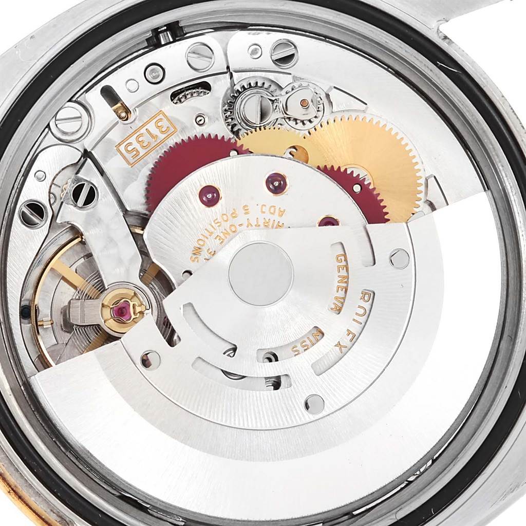 This image shows a close-up of the movement and inner mechanisms of a Rolex Turn-o-Graph 116263 Men's Stainless Steel Champagne Dial 116263 Men's Stainless Steel Champagne Dial watch.