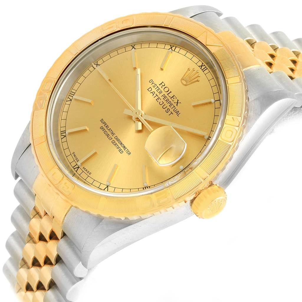 The image shows a Rolex Turn-o-Graph 16263 Men
s Steel and Gold (two tone) Champagne Dial 16263 Men
s Steel and Gold (two tone) Champagne Dial model watch at an angled view, highlighting the gold bezel and dial.