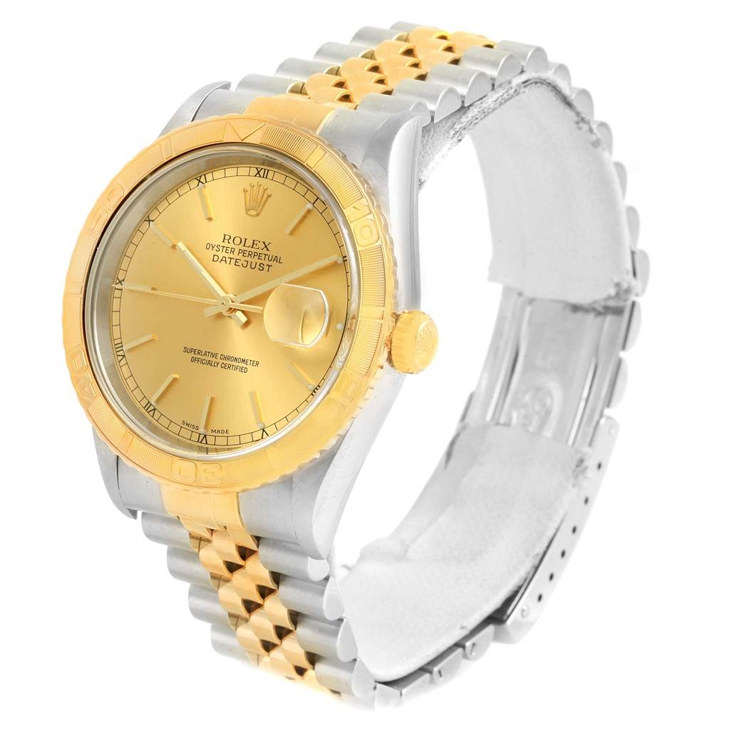 The image shows a Rolex Turn-o-Graph 16263 Men
s Steel and Gold (two tone) Champagne Dial 16263 Men
s Steel and Gold (two tone) Champagne Dial watch from a front-right angle, highlighting the gold bezel, dial, and two-tone bracelet.