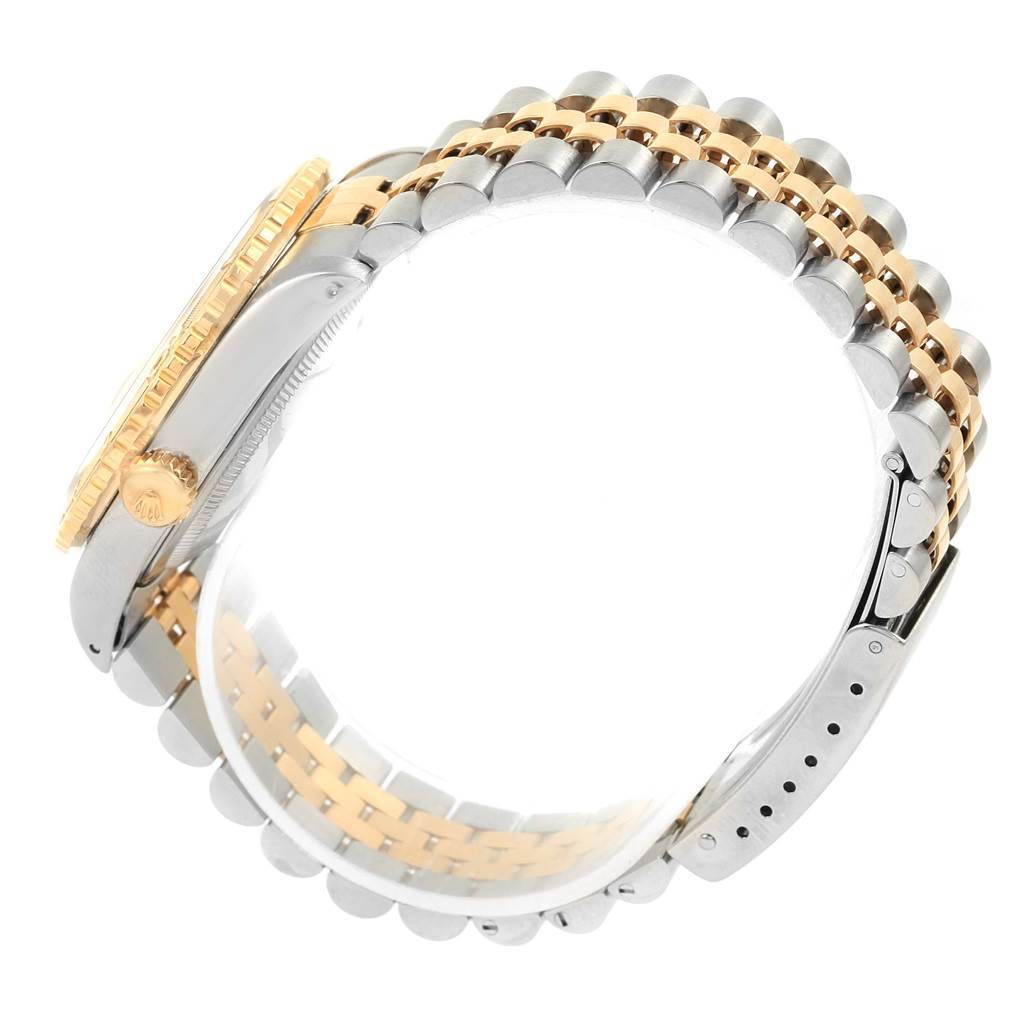 This image shows a side view of the Rolex Turn-o-Graph 16263 Men
s Steel and Gold (two tone) Champagne Dial 16263 Men
s Steel and Gold (two tone) Champagne Dial, highlighting the case, crown, and bi-metal bracelet.