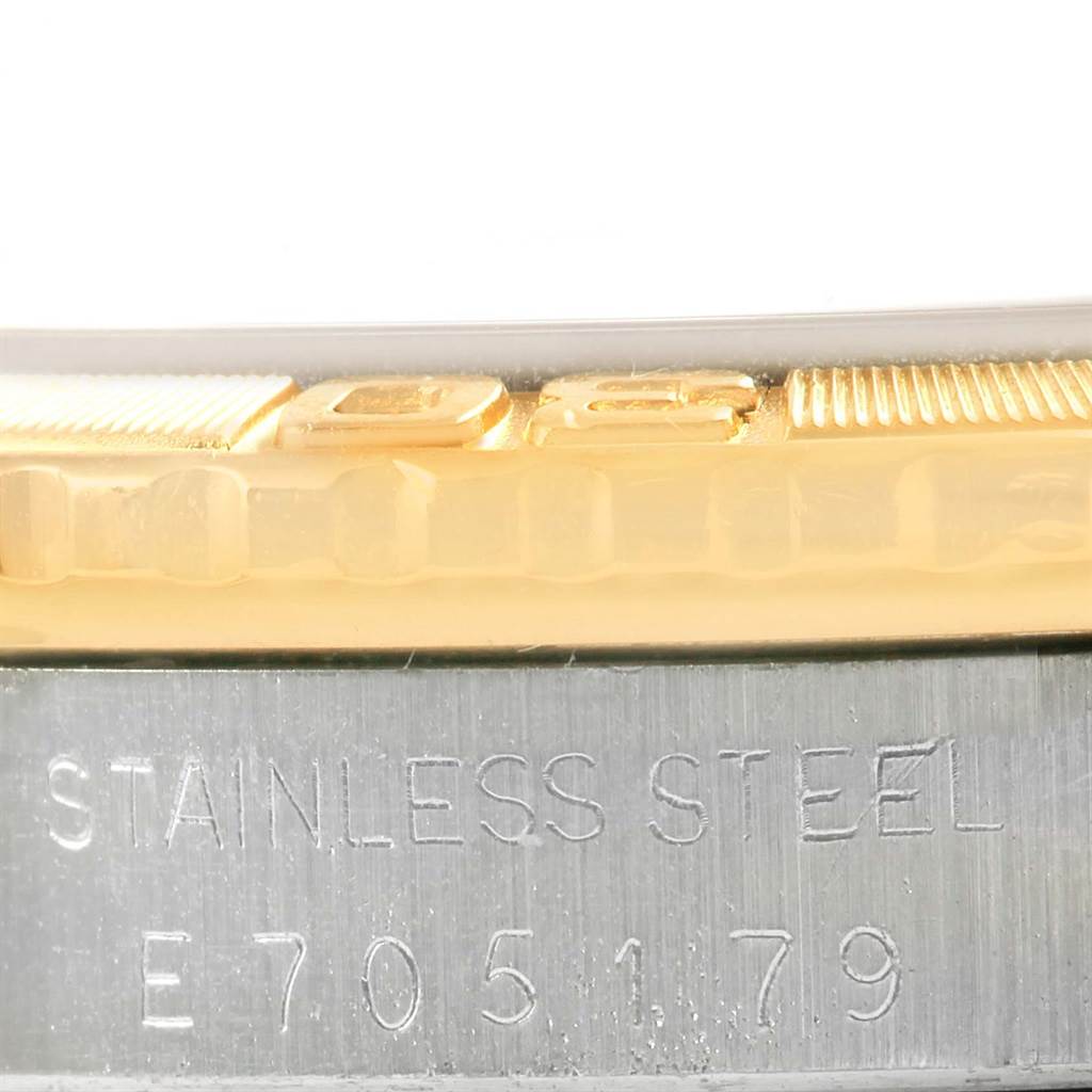 This close-up image shows the edge of the bezel and the stainless steel part of the Rolex Turn-o-Graph 16263 Men
s Steel and Gold (two tone) Champagne Dial 16263 Men
s Steel and Gold (two tone) Champagne Dial watch.