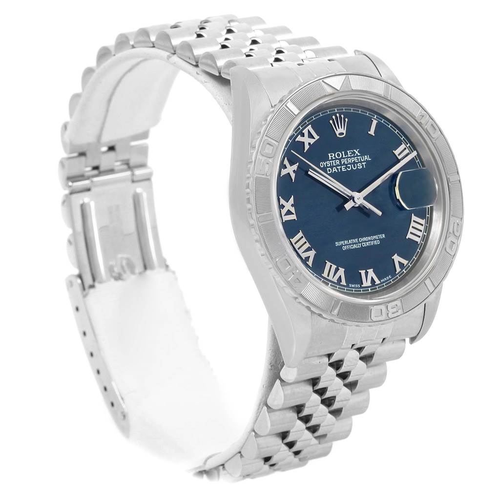 The image shows a Rolex Turn-o-Graph 16264 Men's Stainless Steel Blue Dial 16264 Men's Stainless Steel Blue Dial watch at an angle highlighting the dial, bezel, and partially opened bracelet.