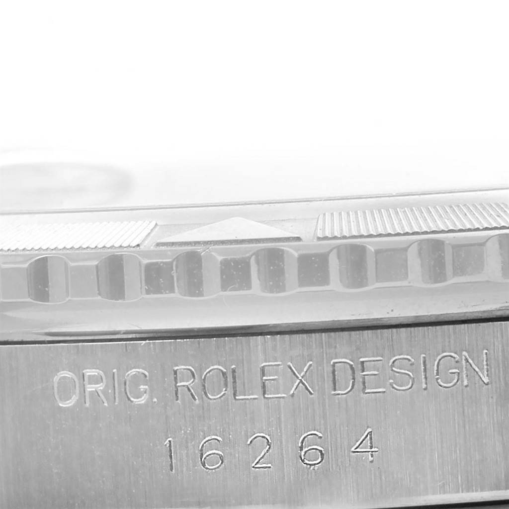 This image shows the edge of the bezel and the case, including the engraved model number, of the Rolex Turn-o-Graph 16264 Men's Stainless Steel Blue Dial 16264 Men's Stainless Steel Blue Dial watch.