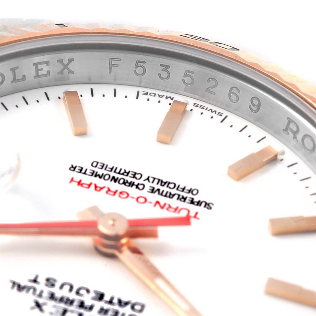 This image shows a close-up of the dial, hands, and inner bezel of a Rolex Turn-o-Graph 116261 Men's Stainless Steel White Dial 116261 Men's Stainless Steel White Dial watch.