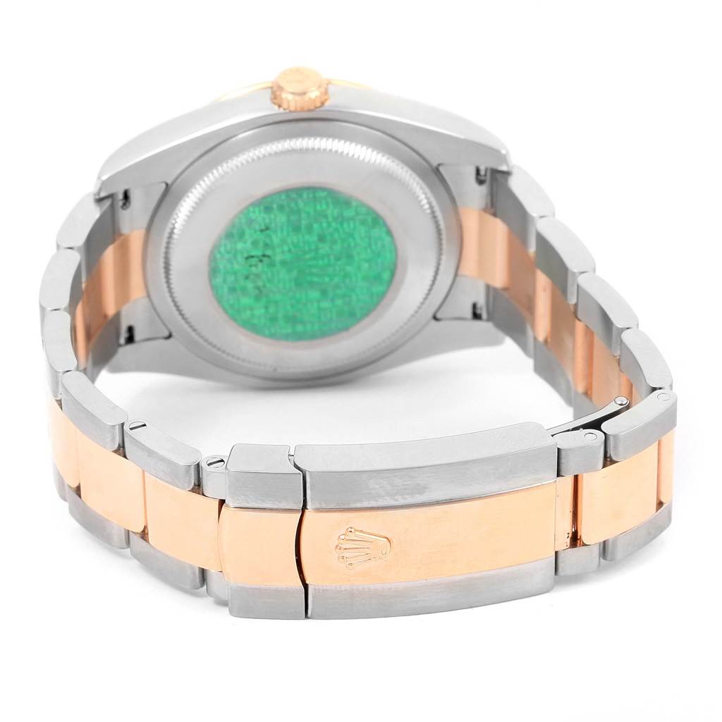 The image shows the back angle of a Rolex Turn-o-Graph 116261 Men's Stainless Steel Black Dial 116261 Men's Stainless Steel Black Dial watch, highlighting its caseback and two-tone bracelet with the Rolex logo on the clasp.