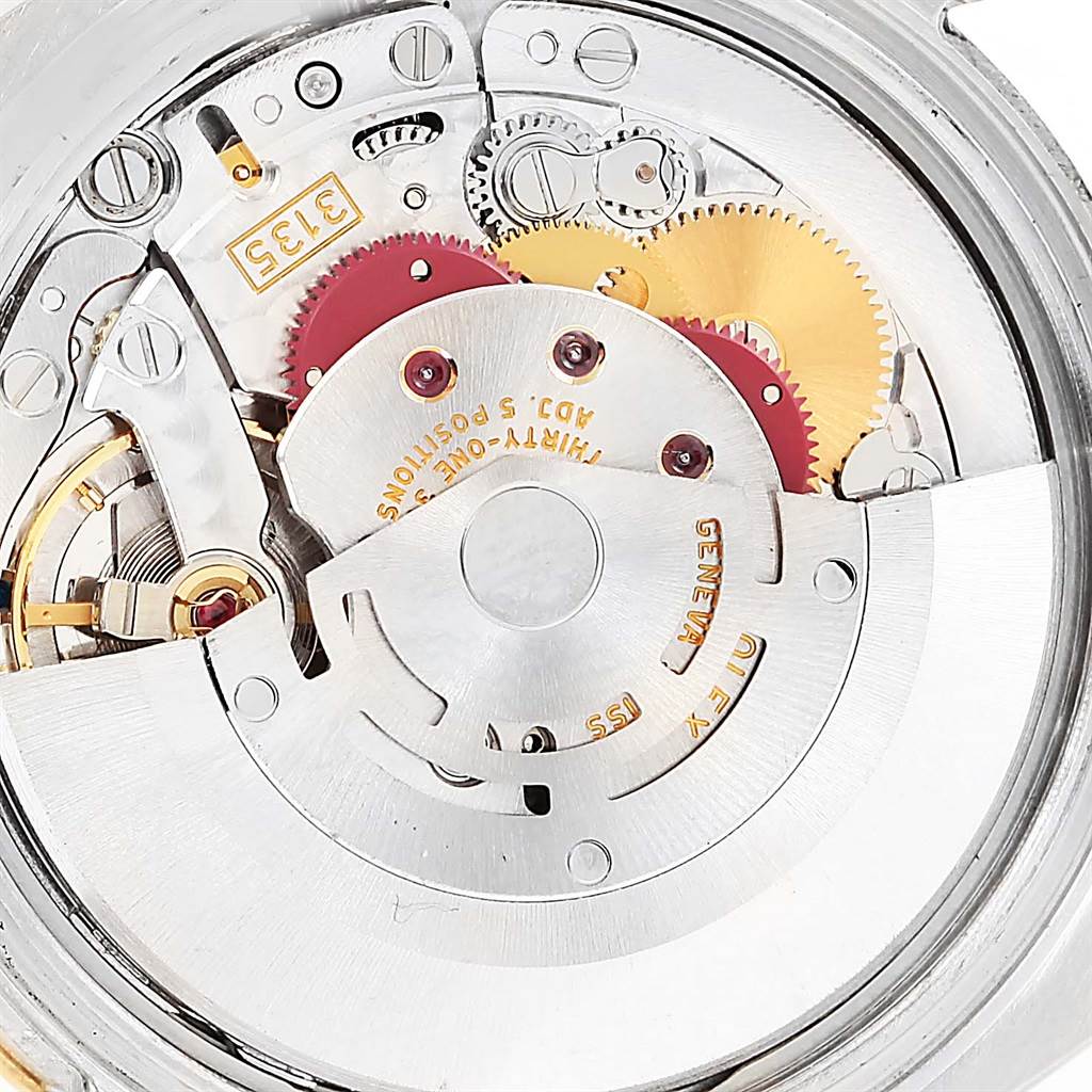 This image shows the internal mechanical movement of a Rolex Turn-o-Graph 116263 Men
s Stainless Steel Champagne Dial 116263 Men
s Stainless Steel Champagne Dial, highlighting gears and components.