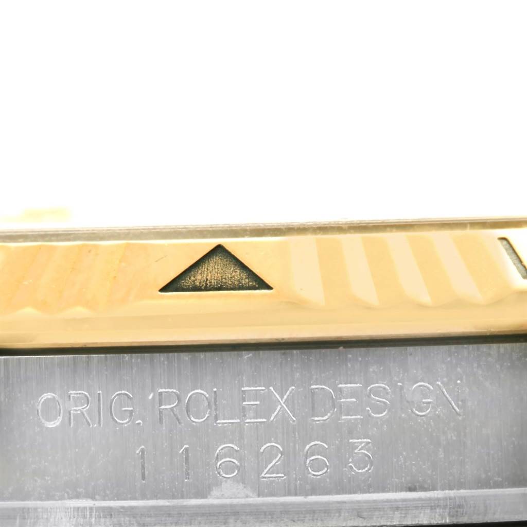 The image shows a close-up of the bezel and case side of a Rolex Turn-o-Graph 116263 Men
s Stainless Steel Champagne Dial 116263 Men
s Stainless Steel Champagne Dial, featuring its engraving and a numbered marker.