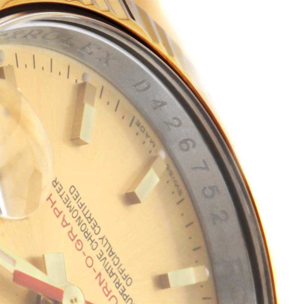 The image shows a close-up of the dial and bezel of a Rolex Turn-o-Graph 116263 Men
s Stainless Steel Champagne Dial 116263 Men
s Stainless Steel Champagne Dial watch, highlighting the markers, text, and part of the serial number.