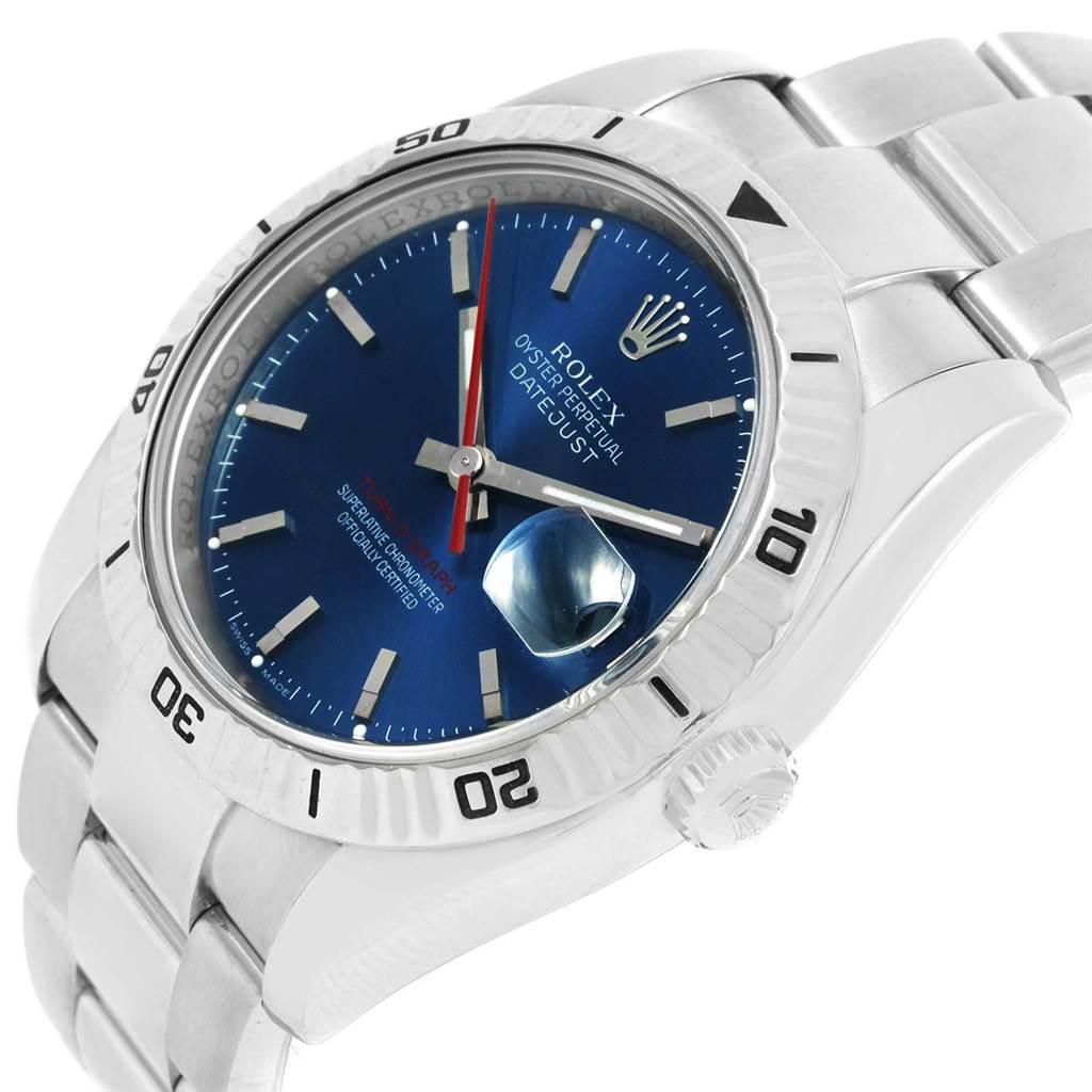The image shows a Turn-o-Graph model Rolex watch from an angled side view, displaying its bezel, crown, dial, and part of its bracelet.