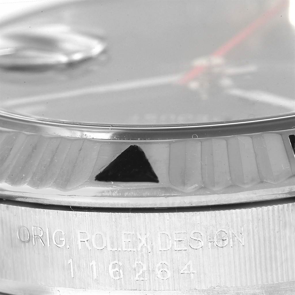 The image shows a close-up of the bezel and design number engraving on a Rolex Turn-o-Graph 116264 Men's Stainless Steel Blue Dial 116264 Men's Stainless Steel Blue Dial watch.