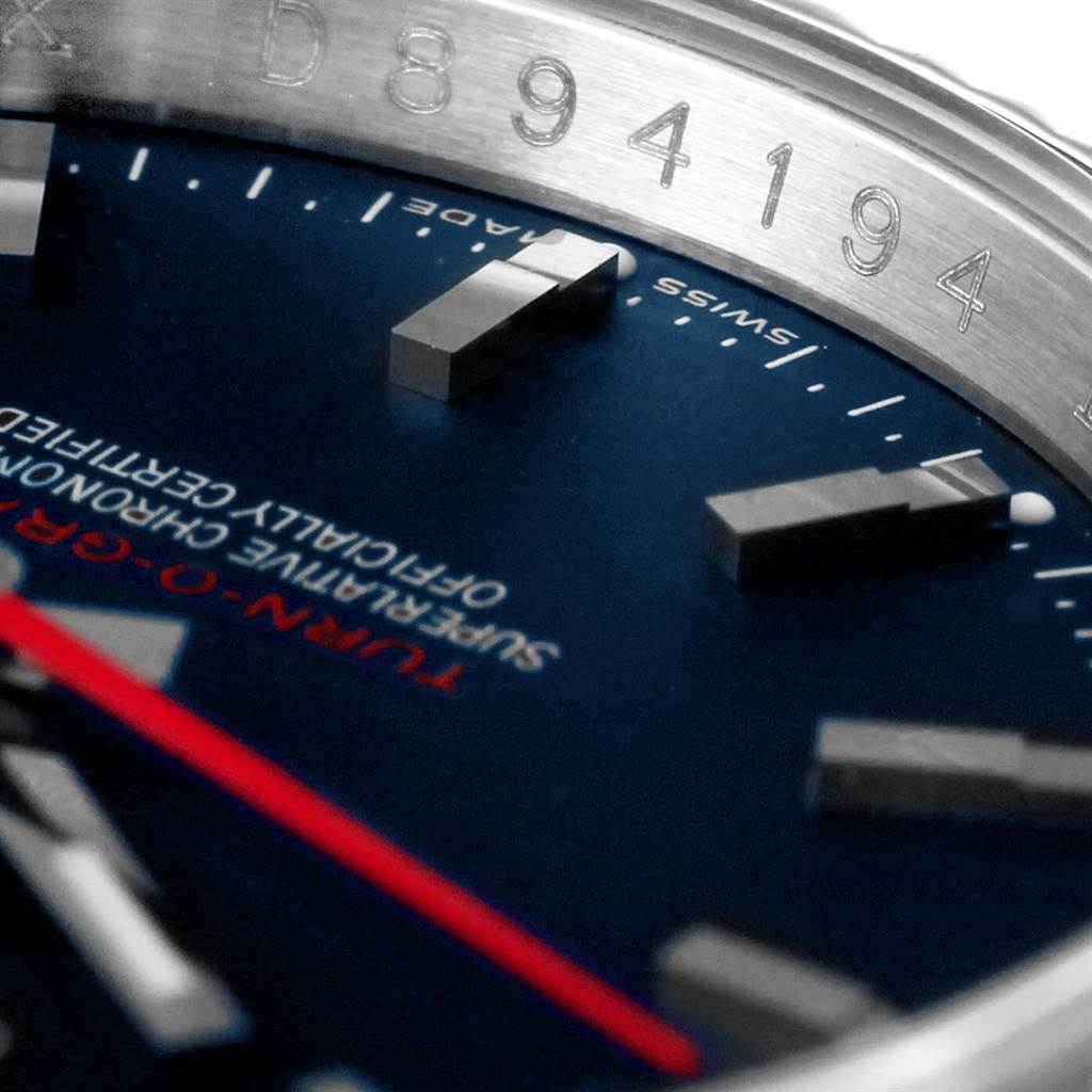 The close-up image shows the dial, hour markers, and part of the bezel with its engravings on a Rolex Turn-o-Graph 116264 Men's Stainless Steel Blue Dial 116264 Men's Stainless Steel Blue Dial watch.