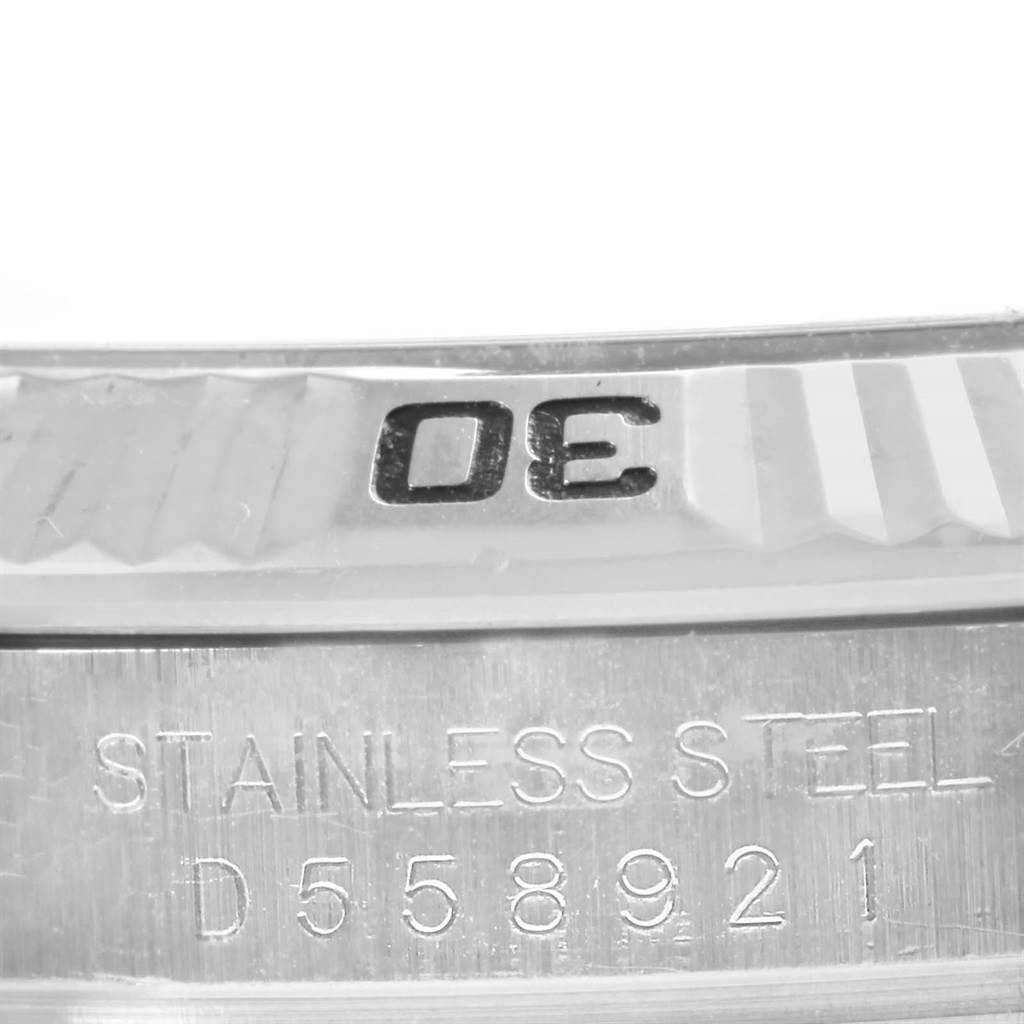 The image shows a close-up of the case side and bezel of the Rolex Turn-o-Graph 116264 Men
s Stainless Steel White Dial 116264 Men
s Stainless Steel White Dial, highlighting the engraving and material details.