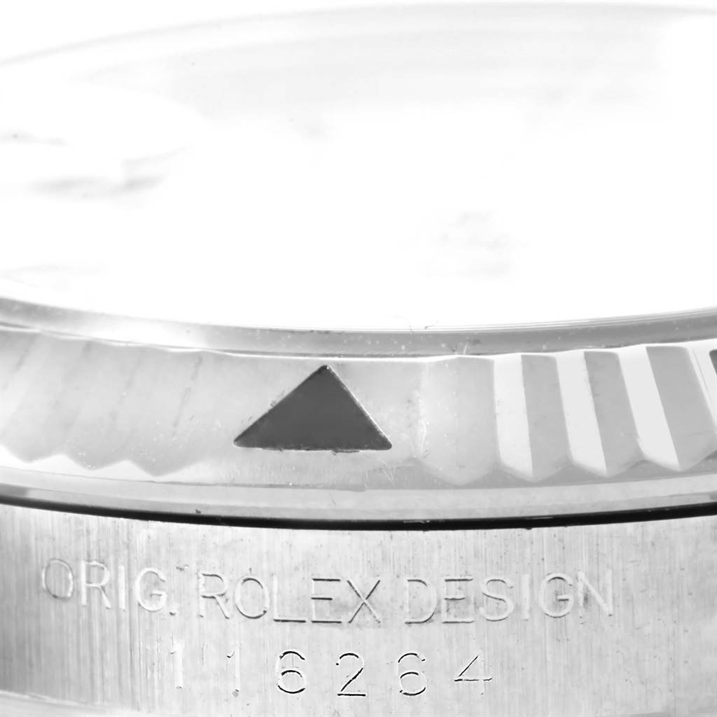 This close-up image shows the bezel and engraved model number of a Rolex Turn-o-Graph 116264 Men
s Stainless Steel White Dial 116264 Men
s Stainless Steel White Dial watch.