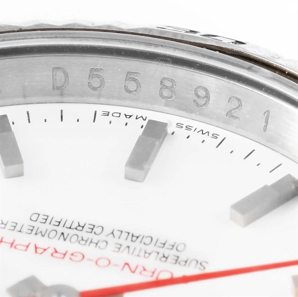 This close-up image focuses on the dial and bezel of the Rolex Turn-o-Graph 116264 Men
s Stainless Steel White Dial 116264 Men
s Stainless Steel White Dial model, showing the serial number and part of the indices.
