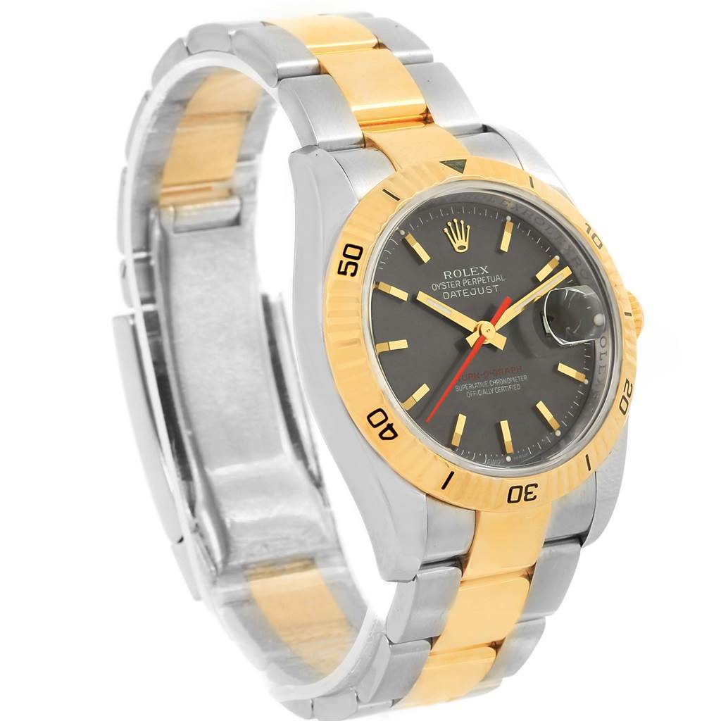 This Rolex Turn-o-Graph 116263 Men's Steel and Gold (two tone) Grey Dial 116263 Men's Steel and Gold (two tone) Grey Dial watch is shown at an angle showcasing its two-tone bracelet, fluted bezel, and black dial with a date window.