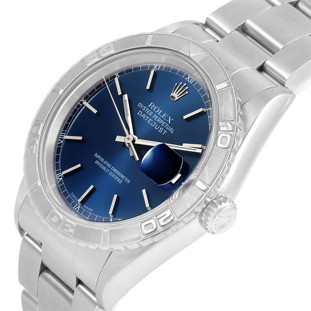 The image showcases a Rolex Turn-o-Graph 16264 Men's Stainless Steel Blue Dial 16264 Men's Stainless Steel Blue Dial model from an angled top-down view, highlighting its dial, bezel, crown, and bracelet.