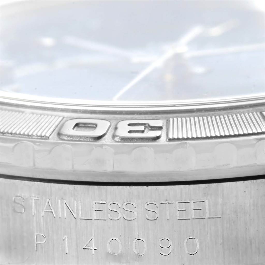 This close-up image shows the stainless steel bezel and engraving of the Rolex Turn-o-Graph 16264 Men's Stainless Steel Blue Dial 16264 Men's Stainless Steel Blue Dial model P140090.