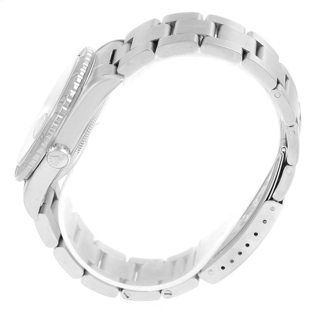 The Rolex Turn-o-Graph 16264 Men's Stainless Steel Blue Dial 16264 Men's Stainless Steel Blue Dial watch is shown in a side profile, focusing on the case, bezel, crown, and bracelet.