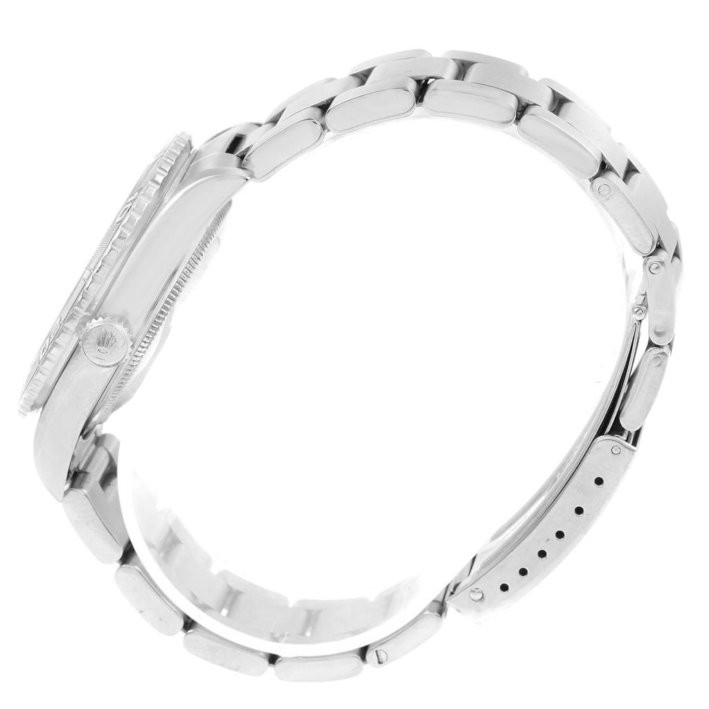 This image shows the side profile of a Rolex Turn-o-Graph 16264 Men's Stainless Steel Silver Dial 16264 Men's Stainless Steel Silver Dial watch, highlighting its crown, bezel, and bracelet.