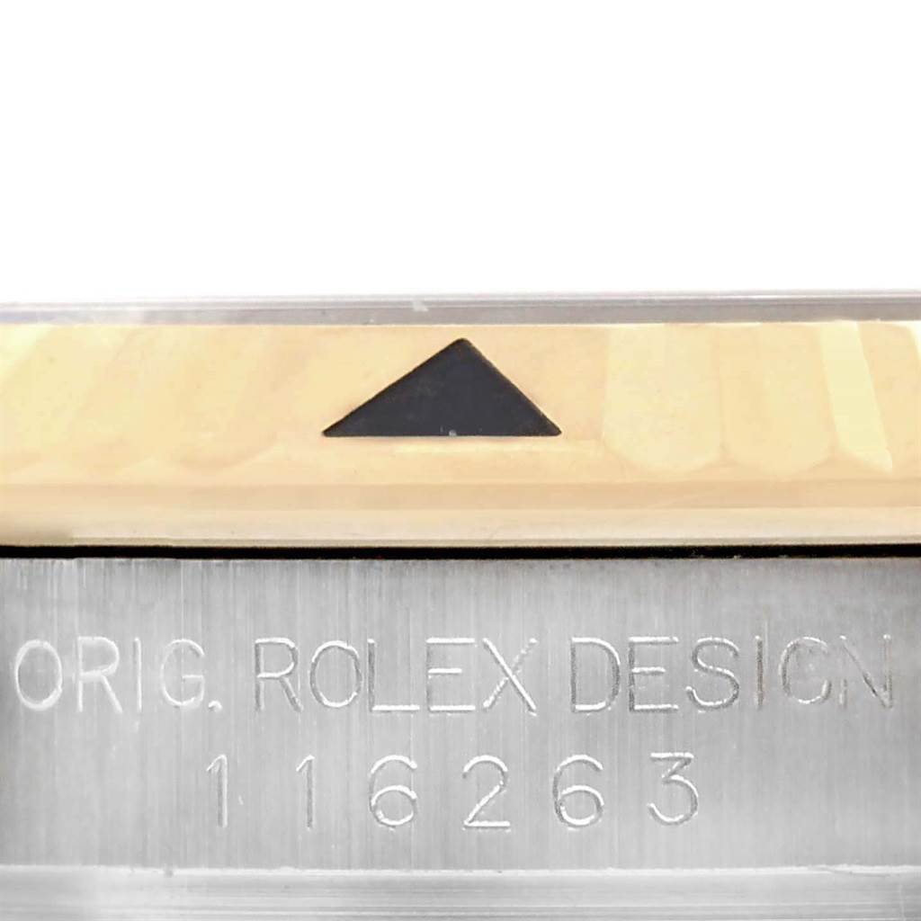 This image shows a close-up of the bezel and engraved case side of the Rolex Turn-o-Graph 116263 Men
s Stainless Steel White Dial 116263 Men
s Stainless Steel White Dial model, displaying part of the reference number.