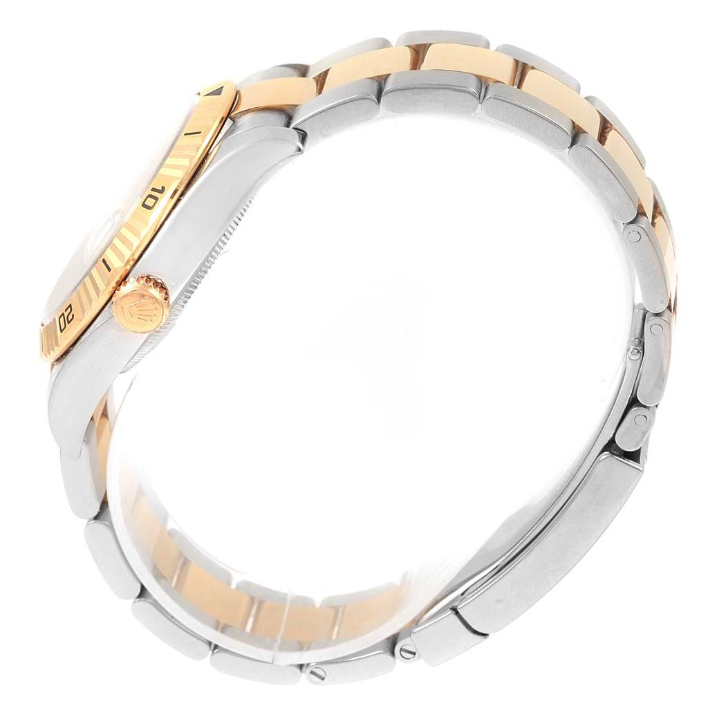 The Rolex Turn-o-Graph 116263 Men
s Stainless Steel White Dial 116263 Men
s Stainless Steel White Dial watch is shown from a side angle, highlighting the bezel, crown, and two-tone bracelet.