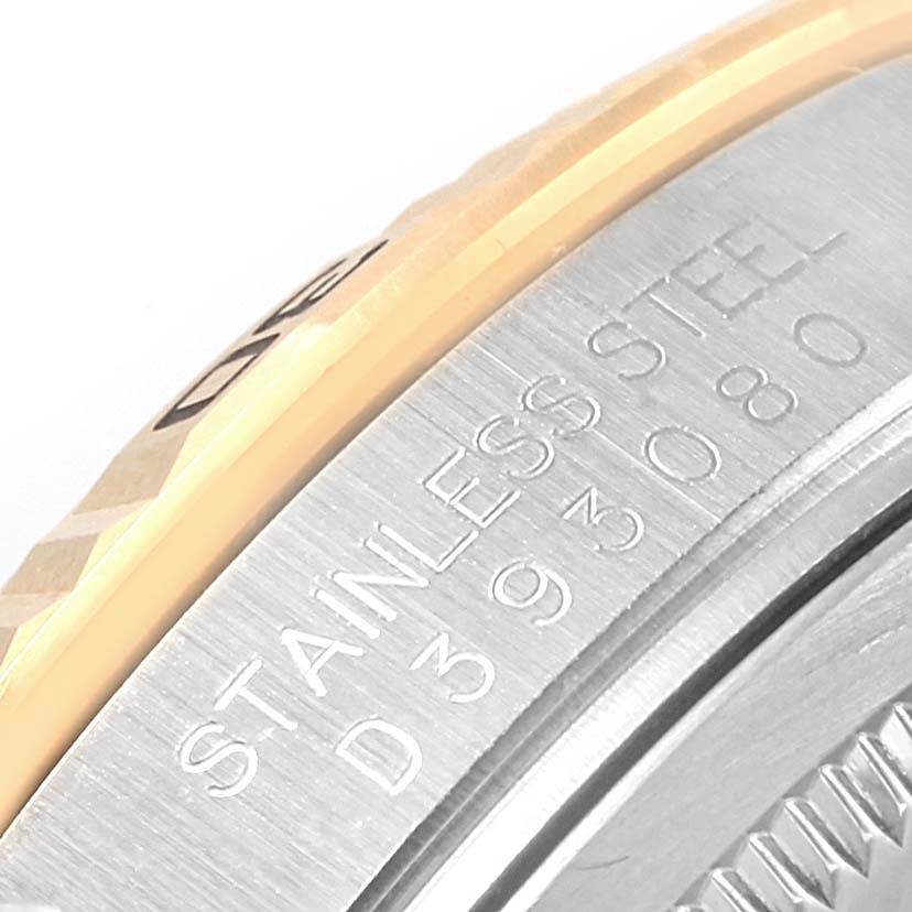 This image shows a close-up of the side of a Rolex Turn-o-Graph 116263 Men
s Stainless Steel White Dial 116263 Men
s Stainless Steel White Dial watch, highlighting its stainless steel casing and part of the bezel.