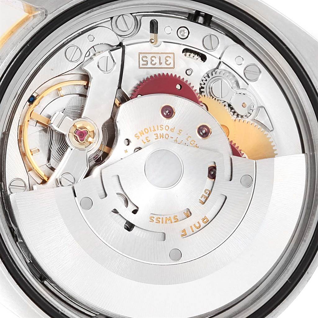 This image shows a close-up view of the movement mechanism inside a Rolex Turn-o-Graph 116263 Men
s Stainless Steel White Dial 116263 Men
s Stainless Steel White Dial watch.