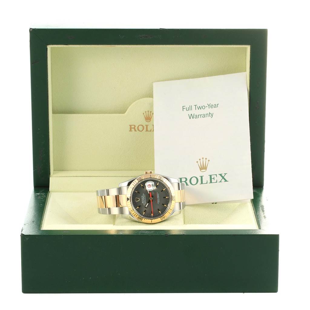 The Rolex Turn-o-Graph 116263 Men's Steel and Gold (two tone) Grey Dial 116263 Men's Steel and Gold (two tone) Grey Dial watch is shown from the front, seated in its box with the warranty card beside it.