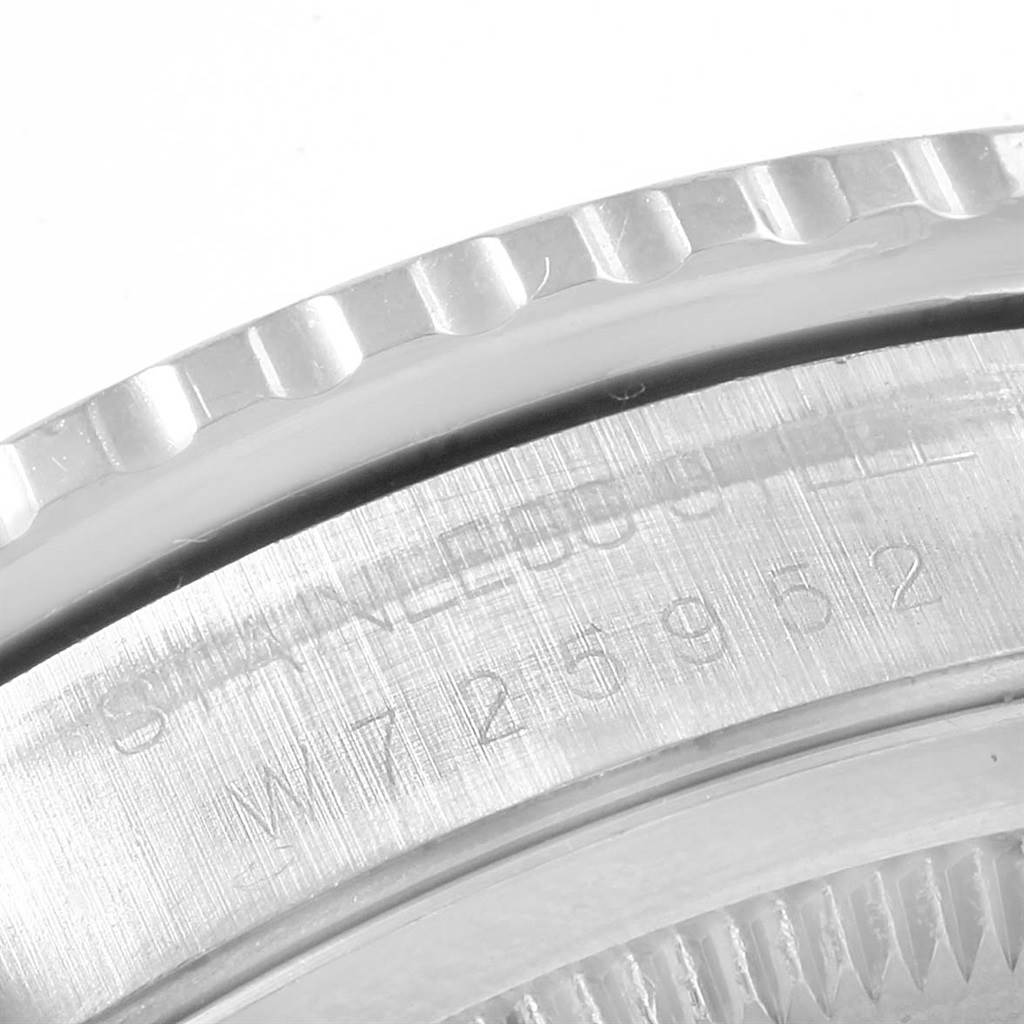 The image shows a close-up of the serial number engraved on the case back of a Rolex Turn-o-Graph 16264 Men's Stainless Steel Black Dial 16264 Men's Stainless Steel Black Dial model.