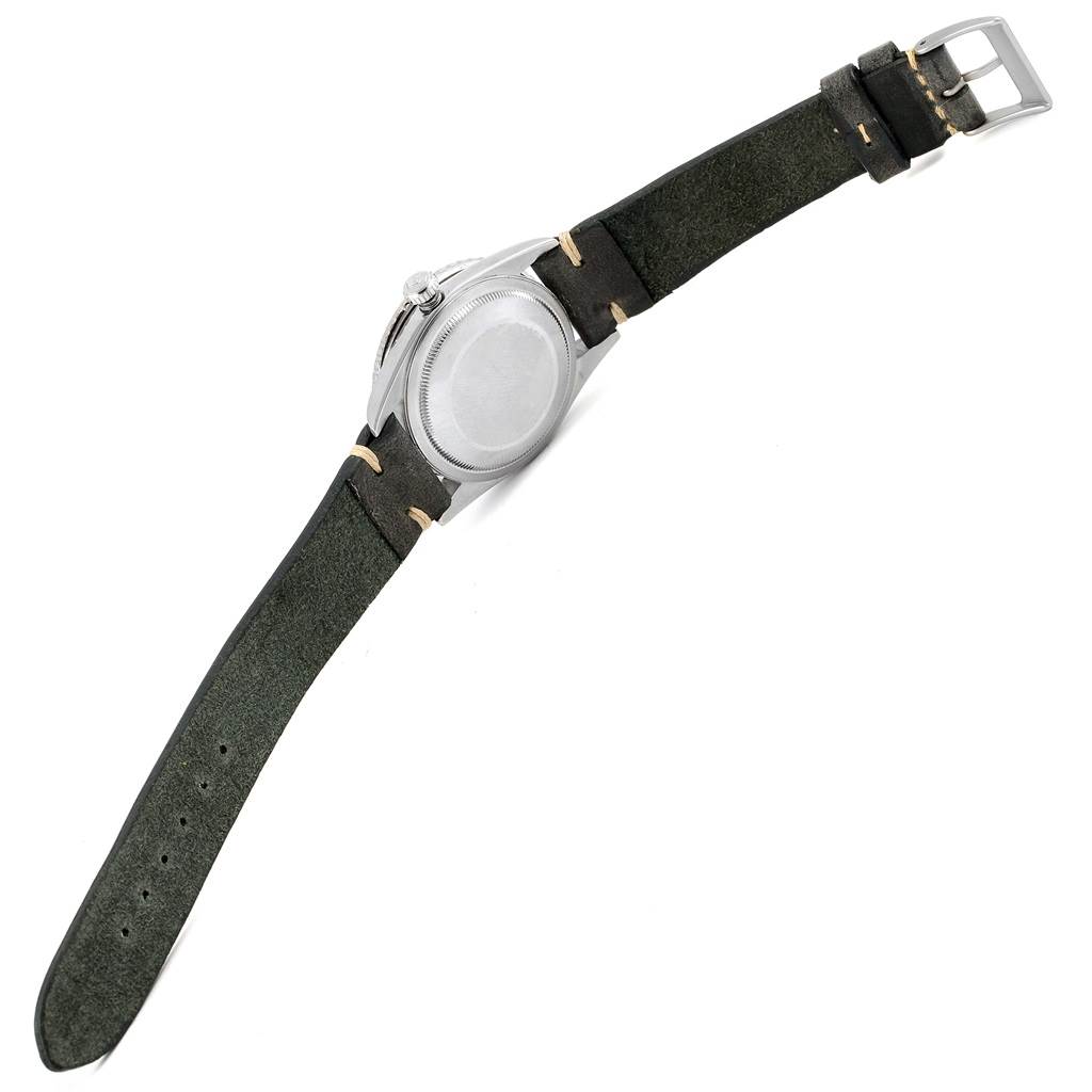 This image shows the back view of a Rolex Turn-o-Graph 16264 Men's Stainless Steel Black Dial 16264 Men's Stainless Steel Black Dial watch with a leather strap.