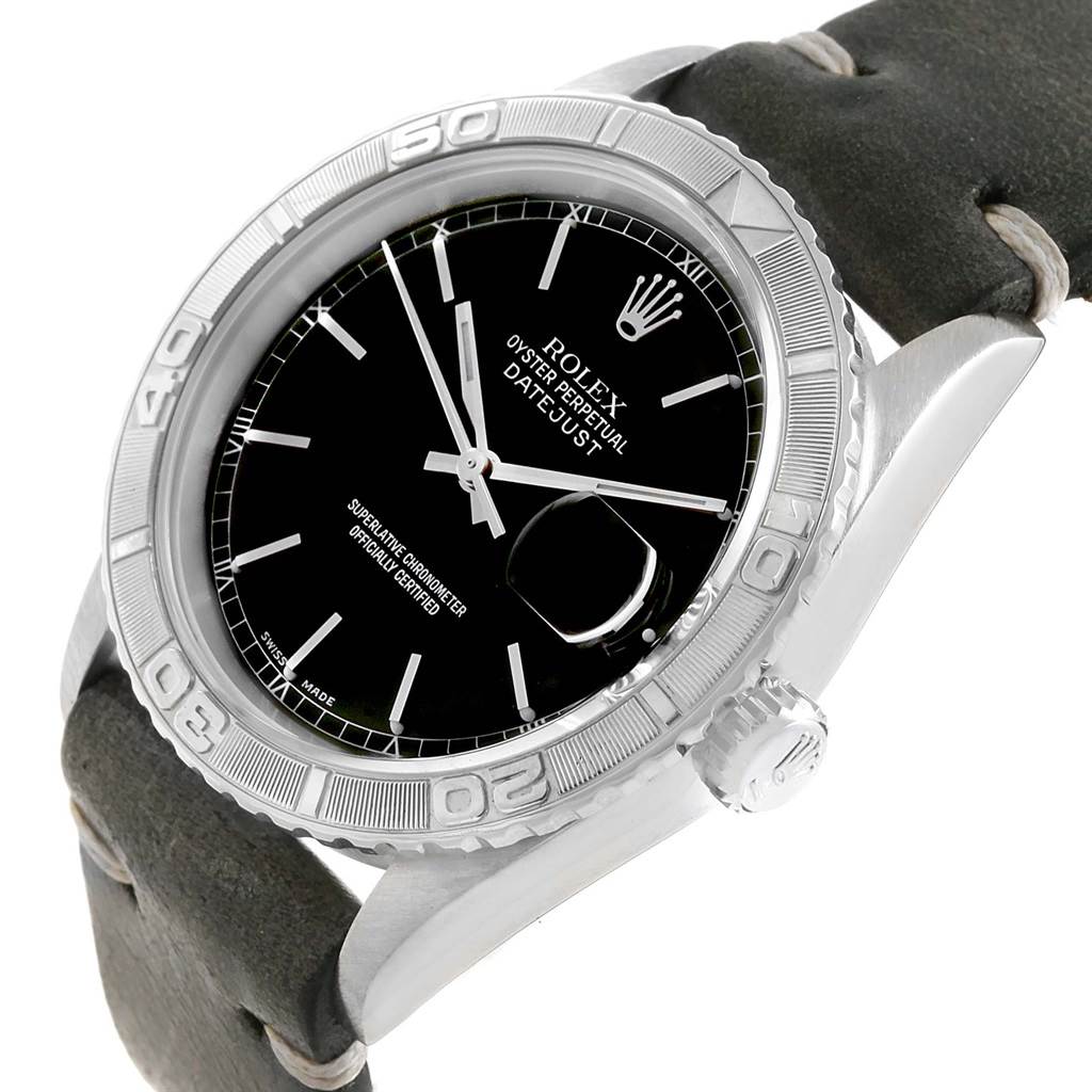 The Rolex Turn-o-Graph 16264 Men's Stainless Steel Black Dial 16264 Men's Stainless Steel Black Dial watch is shown at an angle, highlighting the dial, bezel, crown, and part of the leather strap.