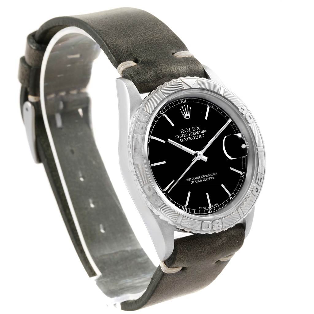 The image shows a Rolex Turn-o-Graph 16264 Men's Stainless Steel Black Dial 16264 Men's Stainless Steel Black Dial watch angled to display the face, bezel, and leather strap clearly.