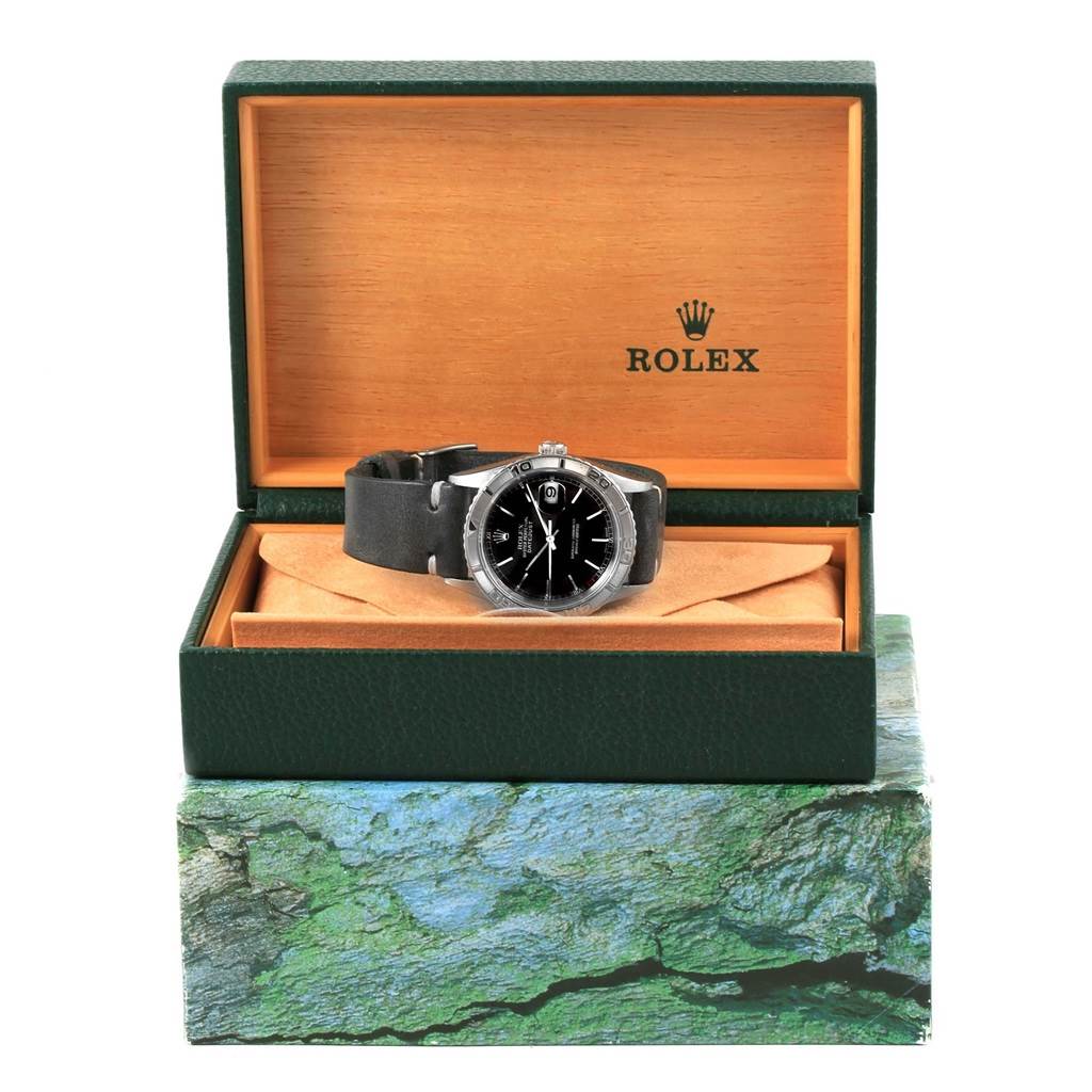 The image shows a Rolex Turn-o-Graph 16264 Men's Stainless Steel Black Dial 16264 Men's Stainless Steel Black Dial watch with a black strap, in an open green box displaying the brand logo.