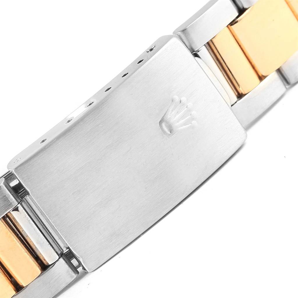 This image shows a close-up of the clasp and part of the bracelet of a Rolex Turn-o-Graph 16263 Men
s Steel and Gold (two tone) Champagne Dial 16263 Men
s Steel and Gold (two tone) Champagne Dial watch.