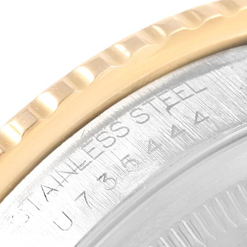 The image shows a close-up of the edge, bezel, and partially visible case back of a Rolex Turn-o-Graph 16263 Men
s Steel and Gold (two tone) Champagne Dial 16263 Men
s Steel and Gold (two tone) Champagne Dial watch.