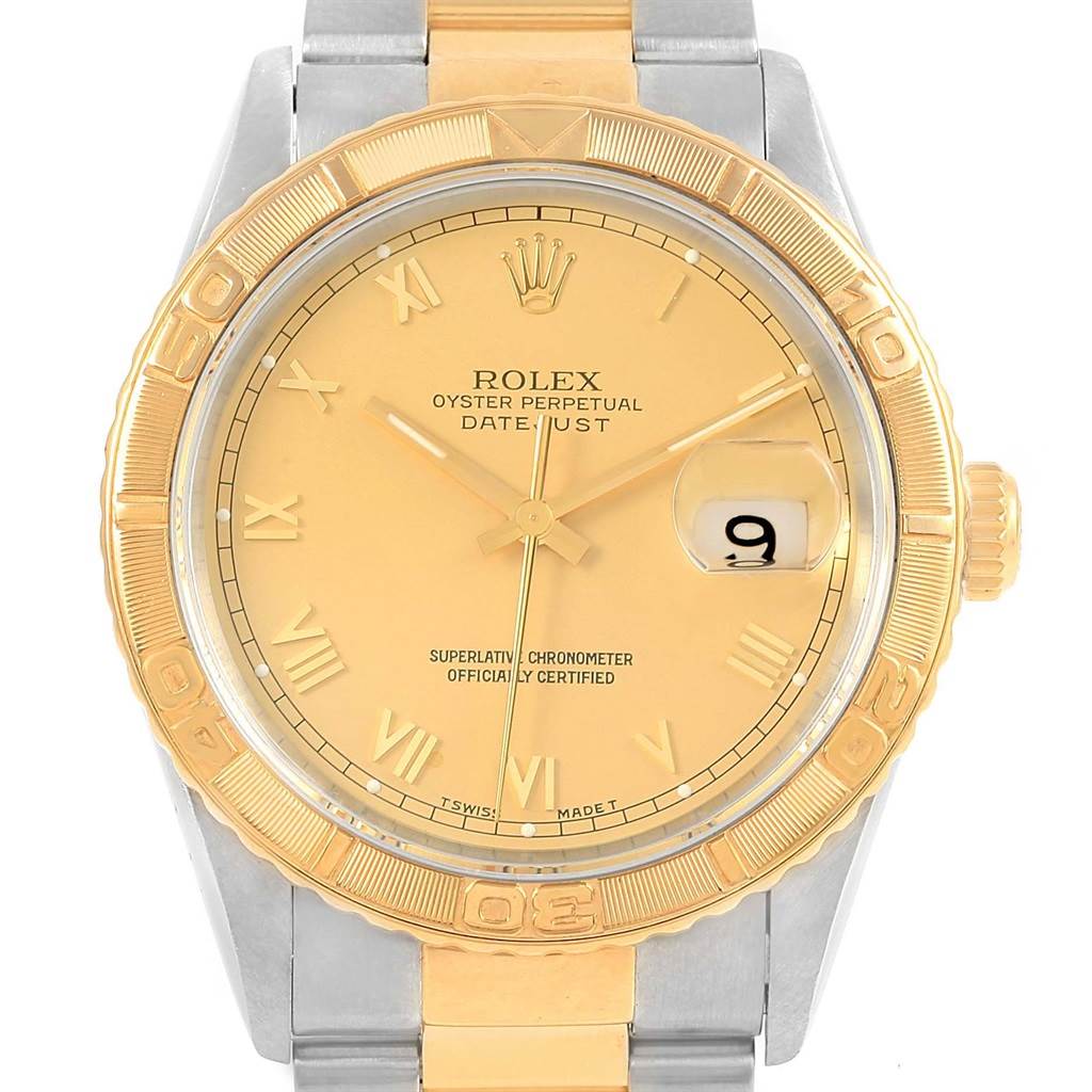 This image shows a frontal view of the Rolex Turn-o-Graph 16263 Men's Steel and Gold (two tone) Champagne Dial 16263 Men's Steel and Gold (two tone) Champagne Dial watch, highlighting its gold bezel, dial, and bracelet.