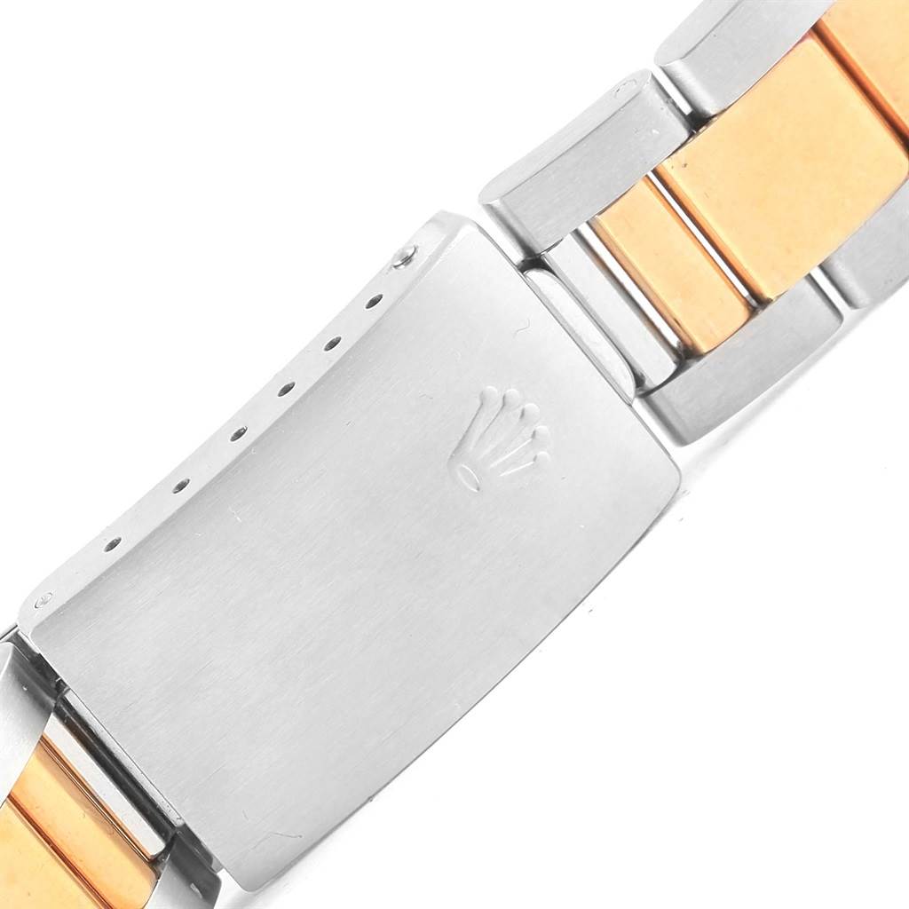 The image shows the clasp and part of the bracelet of a Rolex Turn-o-Graph 16263 Men's Steel and Gold (two tone) Champagne Dial 16263 Men's Steel and Gold (two tone) Champagne Dial watch, featuring silver and gold-toned links.