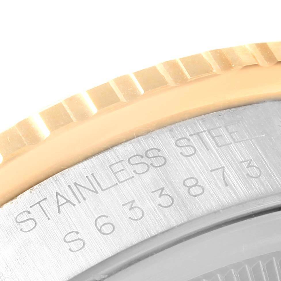 This image shows a close-up of the bezel and case back of a Rolex Turn-o-Graph 16263 Men's Steel and Gold (two tone) Champagne Dial 16263 Men's Steel and Gold (two tone) Champagne Dial watch, highlighting the serial number engraving.